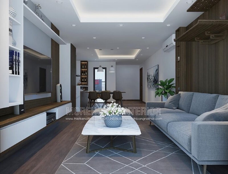 Sofa vải màu xanh trẻ trung là điểm nhấn nổi bật cho không gian phòng khách Thiết kế chung cư