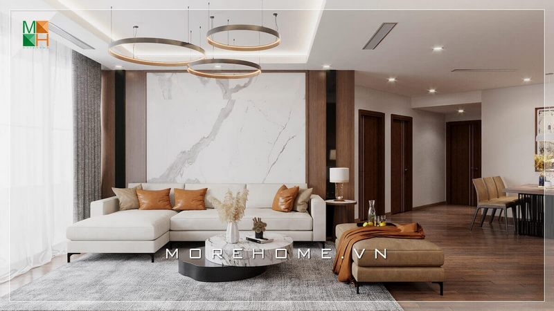 .
Một bộ sofa gỗ bọc nỉ chữ L, một bàn trà bằng đá nhân tạo cùng đèn thả kiểu cách, và vách tường đá kết hợp gỗ, tất cả đã tạo nên một căn phòng khách đẹp mắt và tinh tế, thể hiện được gu thẩm mỹ của gia chủ.